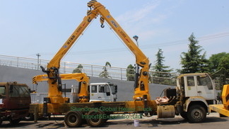 Đồ mới 6X4 HOWO xe tải giường phẳng gắn crane Telescopic Boom Truck